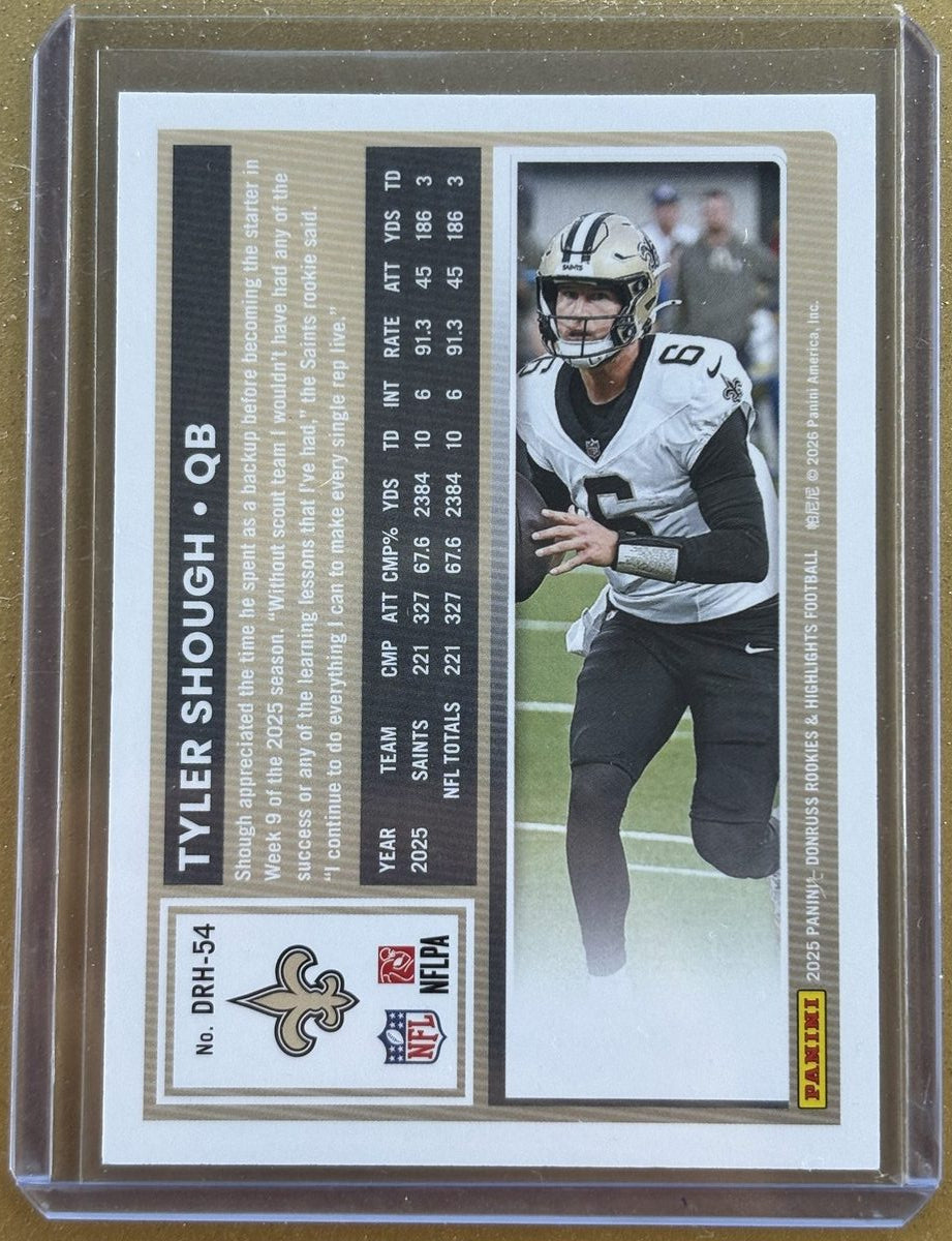 Football trading card of a player in action with team logos and statistics.