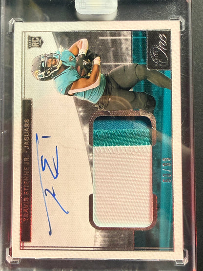 2021 Panini One - Rookie Patch Autograph Travis Etienne #14 50/99 (AU, MEM, RC)