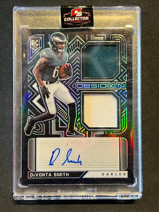2021 Panini Obsidian - Rookie Jersey Ink Devonta Smith #RJI-DS /100 (AU, MEM, RC)