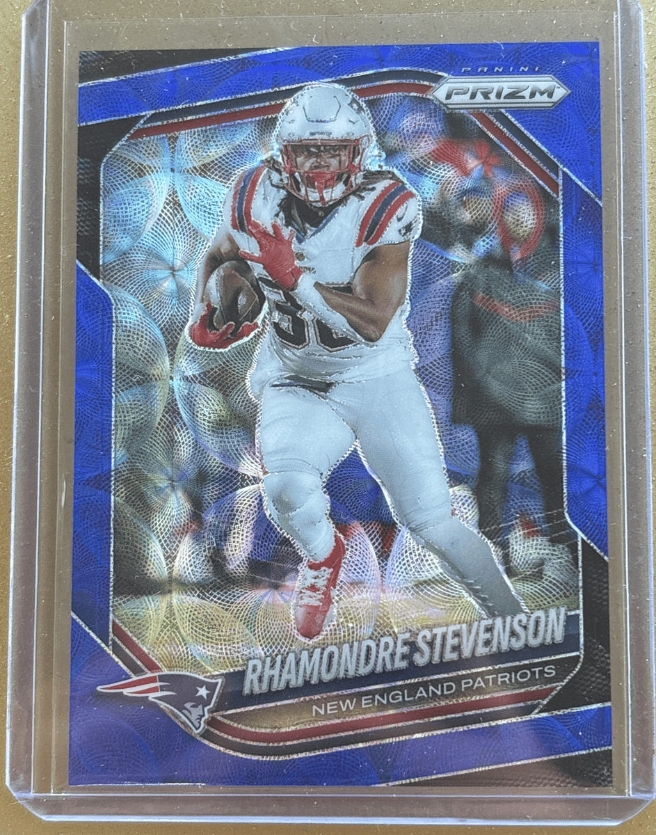 Panini 2025 Prizm Rhamondre Stevenson #84 Choice Blue Prizm /14